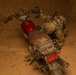 Coalition force members conduct operation in Helmand province