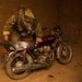 Coalition force members conduct operation in Helmand province