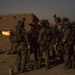 Coalition force members conduct operation in Helmand province