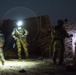 Coalition force members conduct operation in Helmand province