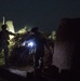 Coalition force members conduct operation in Helmand province