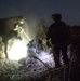 Coalition force members conduct operation in Helmand province