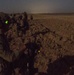 Coalition force members conduct operation in Helmand province