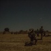 Coalition force members conduct operation in Helmand province