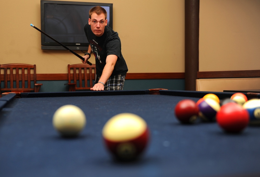 Airman plays pool