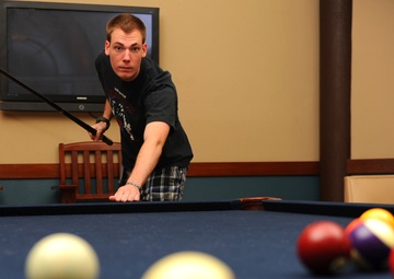 Airman plays pool