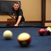 Airman plays pool