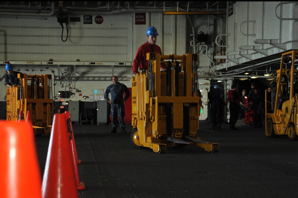 USS Bataan sailor receives forklift training