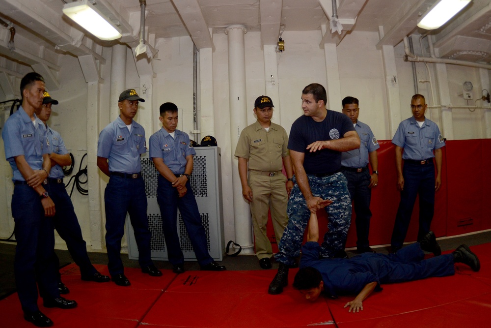 USS Emory S. Land sailors in Philippines