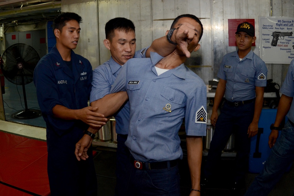 USS Emory S. Land sailors in Philippines