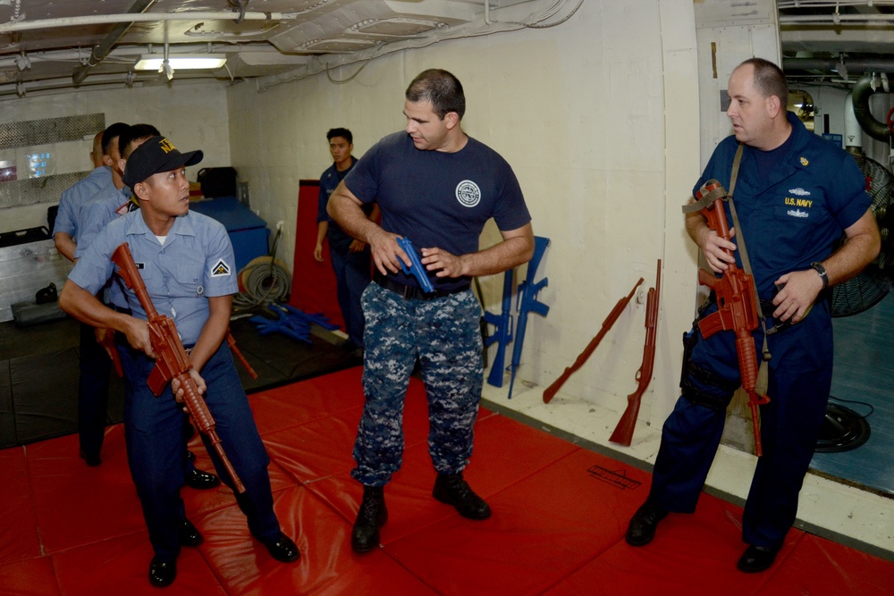 USS Emory S. Land sailors in Philippines