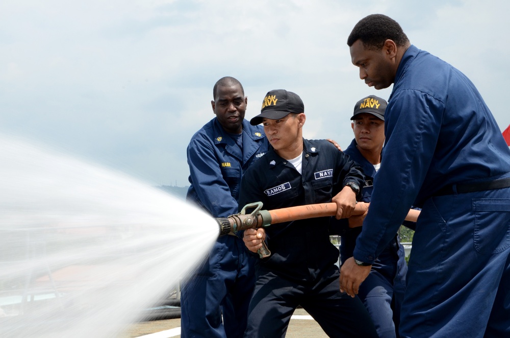 USS Emory S. Land sailors in Philippines