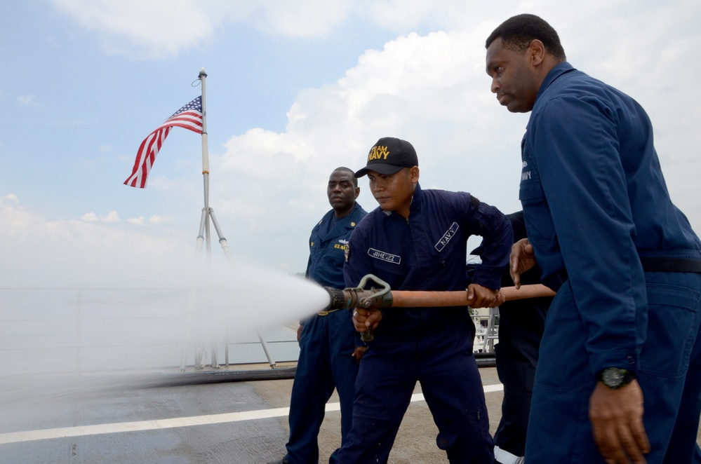 USS Emory S. Land sailors in Philippines