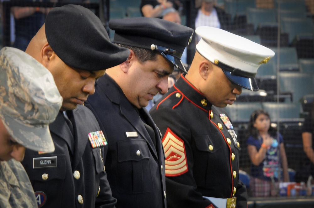 Honorees take a moment of silence during Chicago White Sox 9/11 home game