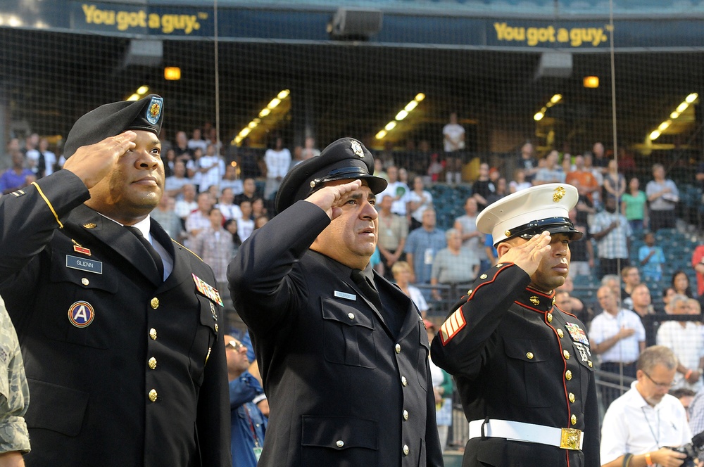 Honorees render a salute during Chicago White Sox 9/11 game