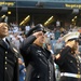 Honorees render a salute during Chicago White Sox 9/11 game