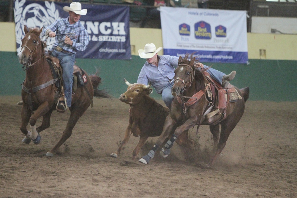 22 SOPS officer doubles as steer wrestler