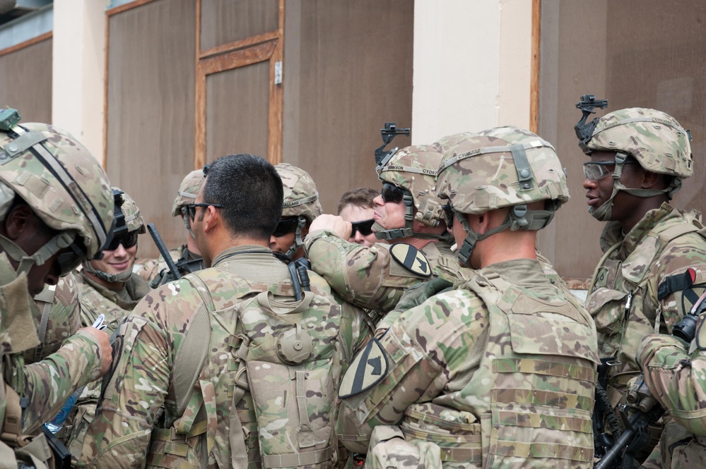 Troop C rubs elbows with locals to thwart enemies