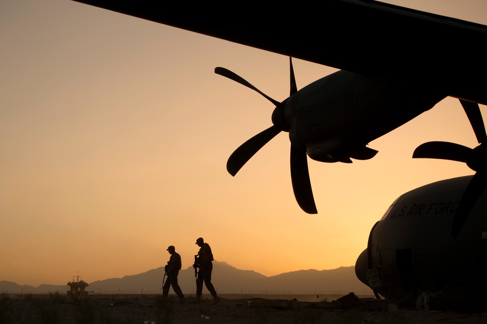 Performing a security check on a plane in Afghanistan