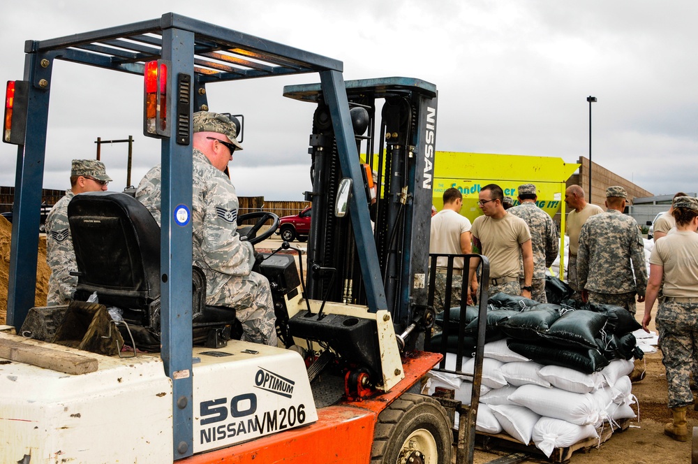 Military units and interagencies aid flooded Colorado areas with sandbags