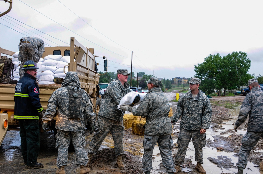 Military units and interagencies aid flooded Colorado areas with sandbags