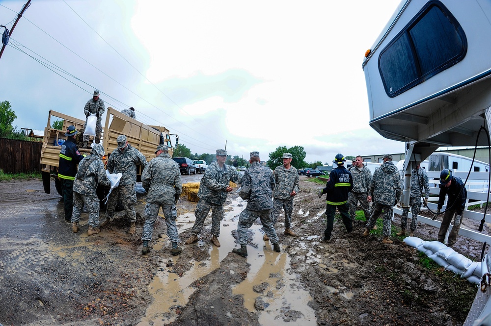 Military units and interagencies aid flooded Colorado areas with sandbags