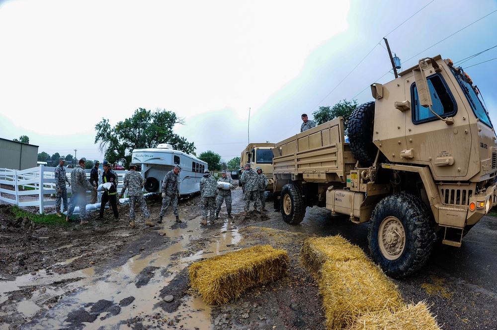 Military units and interagencies aid flooded Colorado areas with sandbags