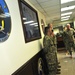 Vice Adm. Miller with sailors from NAVCENT's logistics and infrastructure department