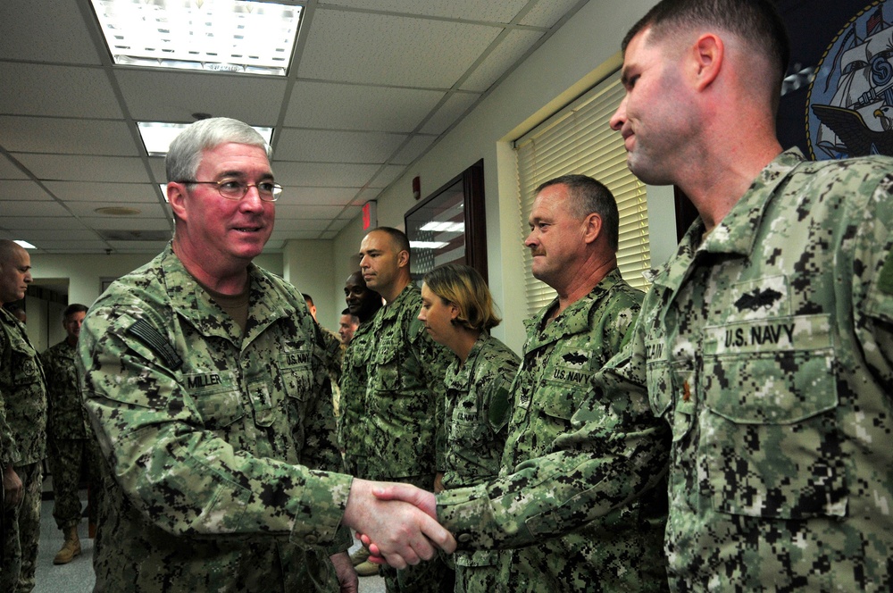 Vice Adm. Miller with sailors from NAVCENT's logistics and infrastructure department