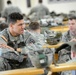 Stand up! JBER paratroopers prep for parachute assault