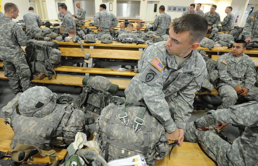 Stand up! JBER paratroopers prep for parachute assault