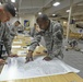 Stand up! JBER paratroopers prep for parachute assault