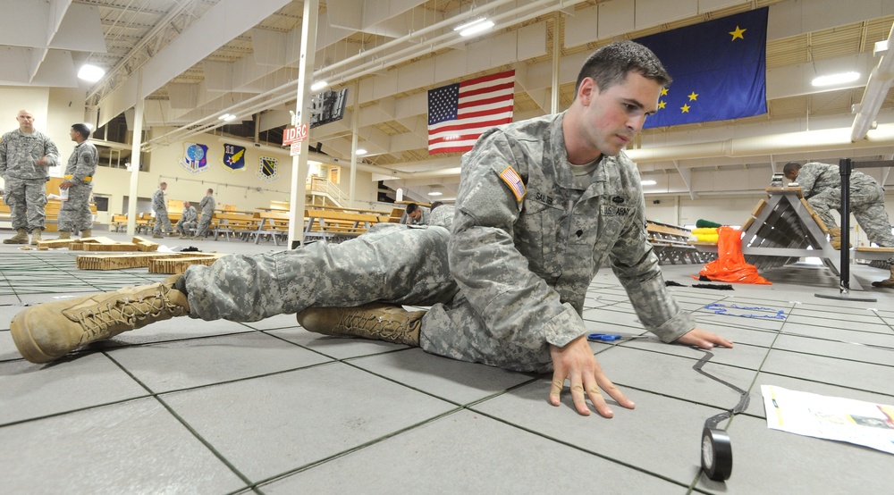 Stand up! JBER paratroopers prep for parachute assault