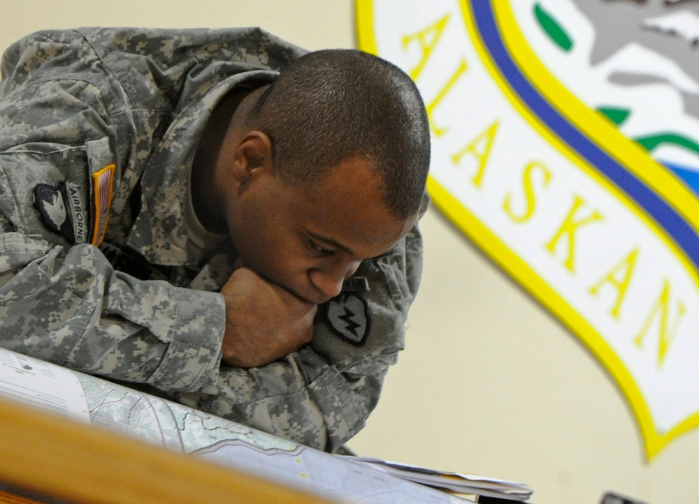 Stand up! JBER paratroopers prep for parachute assault