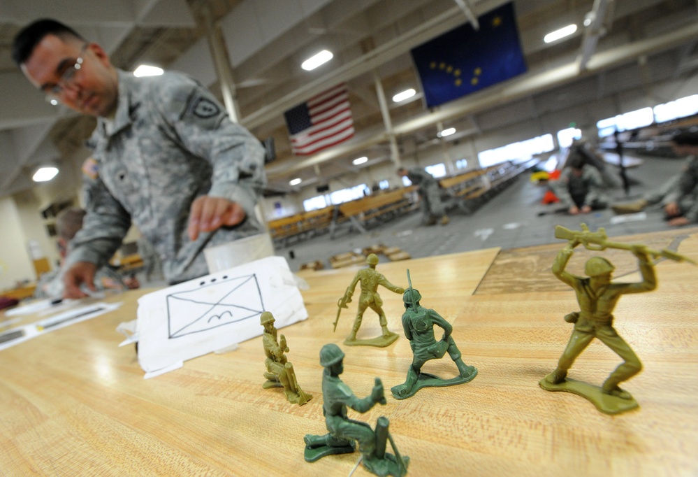 Stand up! JBER paratroopers prep for parachute assault