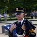 Command Sgt. Maj. Kenneth Kraus carries the last flags flown