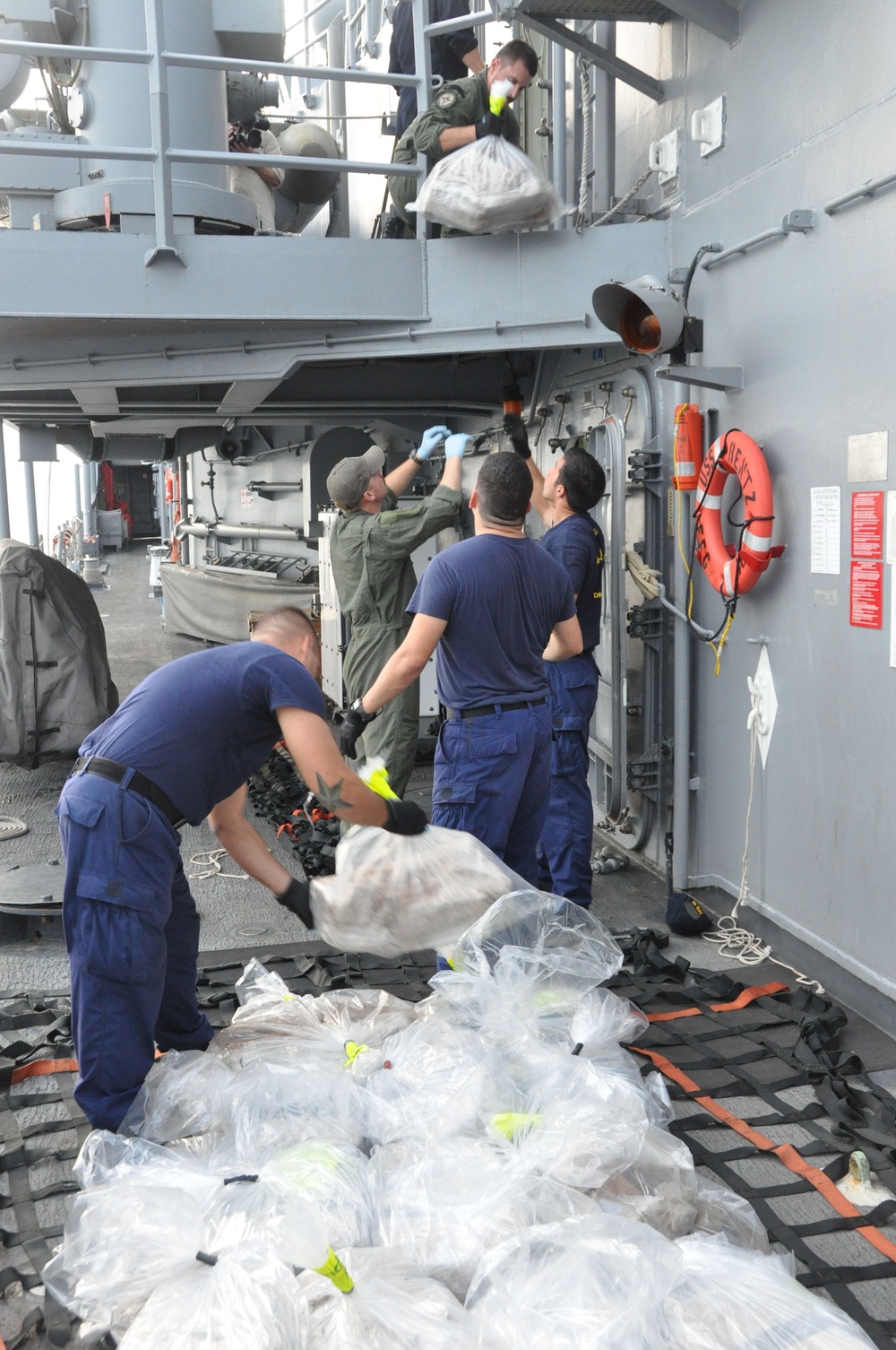 Preparing an estimated $78M of confiscated cocaine for transfer to US Coast Guard cutter USCGC Forward (WMEC 911)