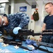 Assembling an M-240B machine gun