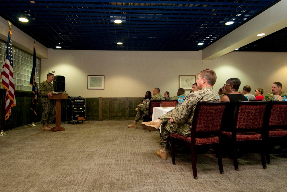 NAVCENT's Rear Adm. Loeblein at an ombudsman appreciation luncheon