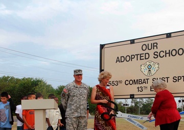 'Gunslingers' bond with students at ribbon cutting and flag raising ceremony