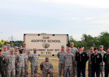 'Gunslingers' bond with students at ribbon cutting and flag raising ceremony
