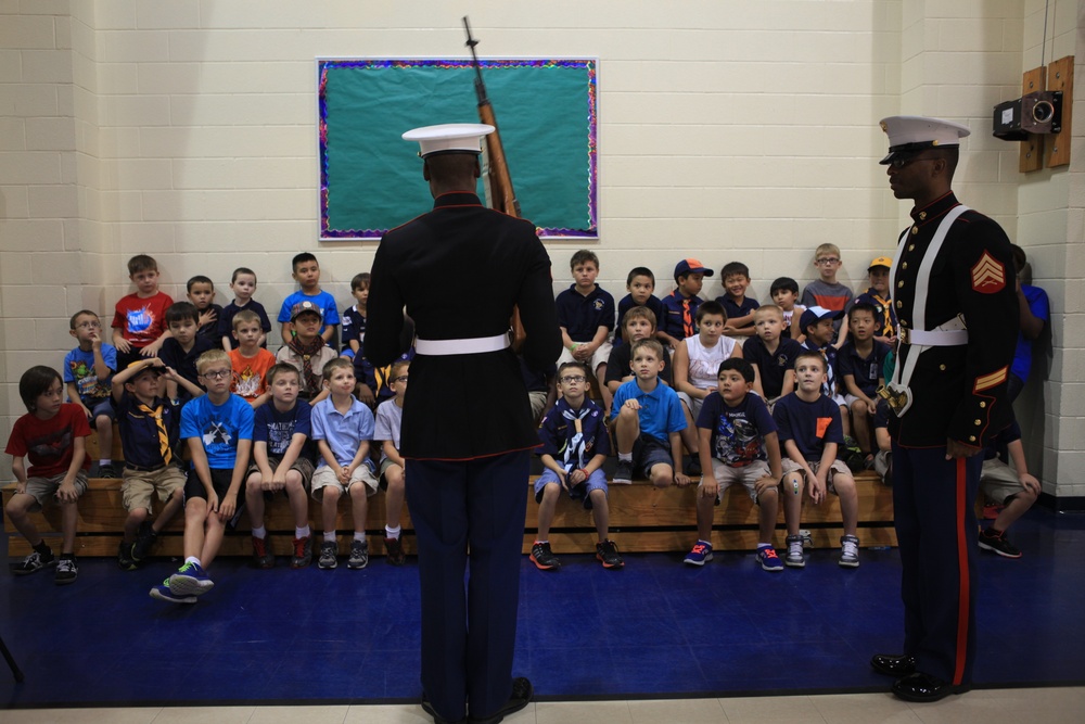These colors don’t run: Marines teach Belle Chasse Cub Scouts flag-folding traditions