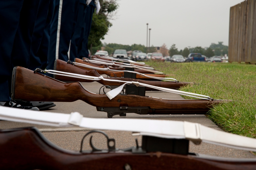 Base honor guard shows respects