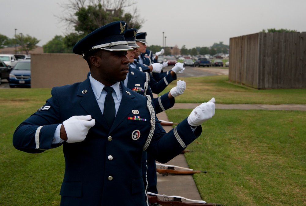 Base honor guard shows respects