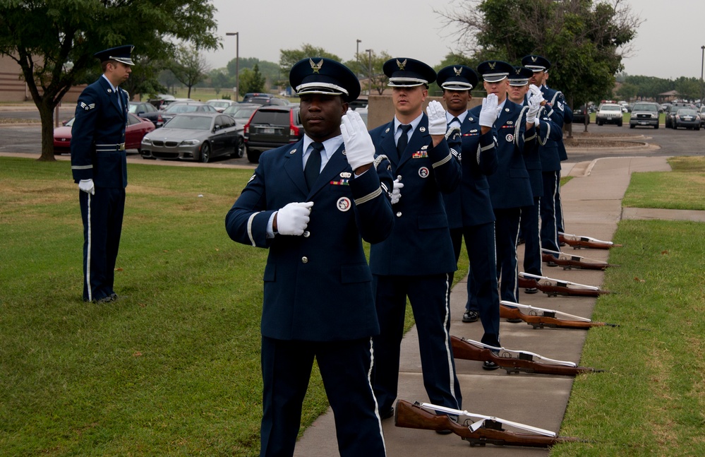 Base honor guard shows respects