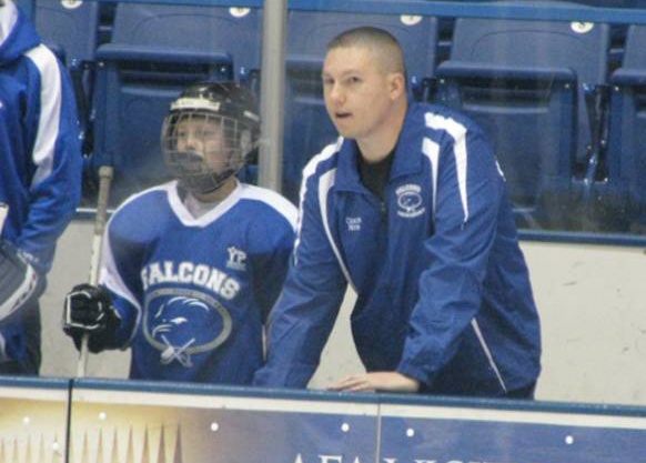 Senior NCO coaches youth hockey