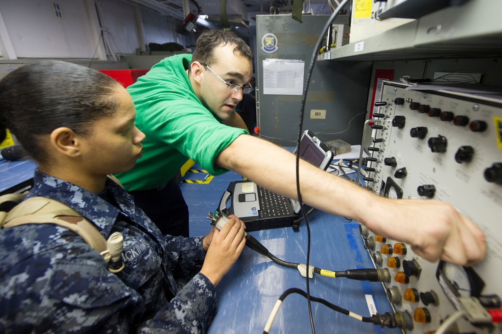 USS Harry S. Truman sailors at work