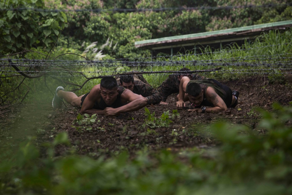 U.S. and Philippine Marines overcome jungle obstacles