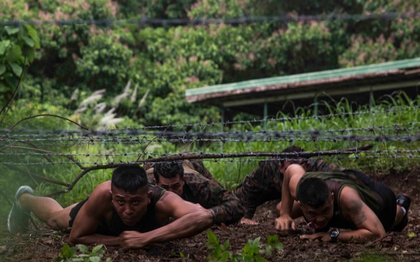 U.S. and Philippine Marines overcome jungle obstacles