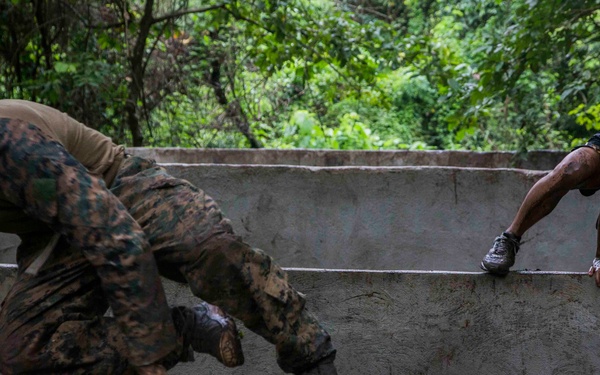 U.S. and Philippine Marines overcome jungle obstacles
